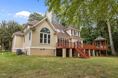 Nestled on nearly half an acre along the 2 mile long Lochmere on Lochmere Golf Club in North Carolina - for sale on GolfHomes.com, golf home, golf lot