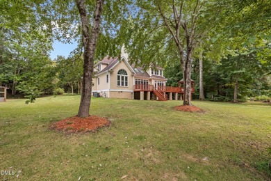 Nestled on nearly half an acre along the 2 mile long Lochmere on Lochmere Golf Club in North Carolina - for sale on GolfHomes.com, golf home, golf lot