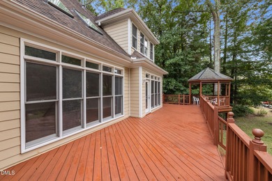 Nestled on nearly half an acre along the 2 mile long Lochmere on Lochmere Golf Club in North Carolina - for sale on GolfHomes.com, golf home, golf lot