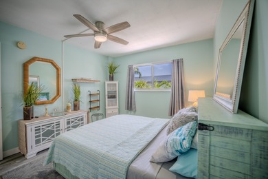 Wake up to glowing Atlantic sunrises and end your day with on Key Colony Beach Golf Course in Florida - for sale on GolfHomes.com, golf home, golf lot