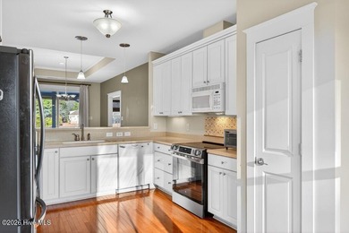 You'll love coming home to this well built, well maintained on Harbour Point Golf Club in North Carolina - for sale on GolfHomes.com, golf home, golf lot