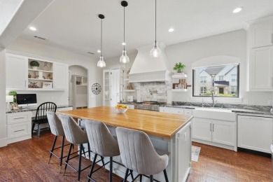 This stunning home sits on a premium corner lot backing to Hole on The Bridges Golf Club in Texas - for sale on GolfHomes.com, golf home, golf lot