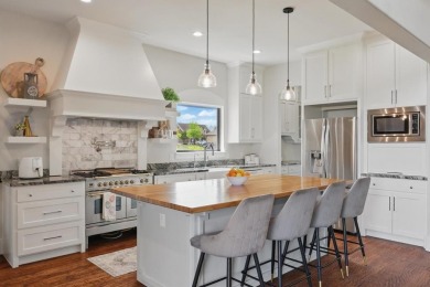 This stunning home sits on a premium corner lot backing to Hole on The Bridges Golf Club in Texas - for sale on GolfHomes.com, golf home, golf lot