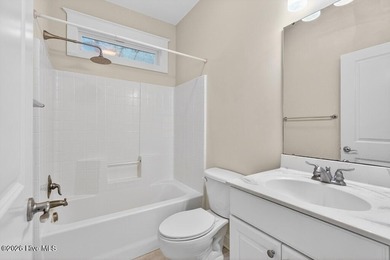 You'll love coming home to this well built, well maintained on Harbour Point Golf Club in North Carolina - for sale on GolfHomes.com, golf home, golf lot