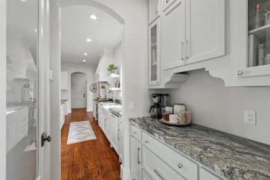 This stunning home sits on a premium corner lot backing to Hole on The Bridges Golf Club in Texas - for sale on GolfHomes.com, golf home, golf lot
