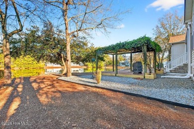 You'll love coming home to this well built, well maintained on Harbour Point Golf Club in North Carolina - for sale on GolfHomes.com, golf home, golf lot