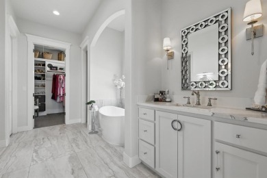 This stunning home sits on a premium corner lot backing to Hole on The Bridges Golf Club in Texas - for sale on GolfHomes.com, golf home, golf lot