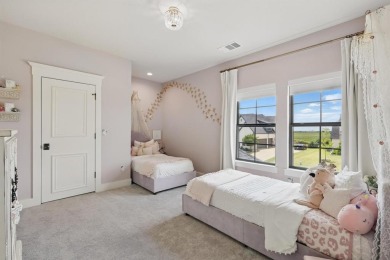 This stunning home sits on a premium corner lot backing to Hole on The Bridges Golf Club in Texas - for sale on GolfHomes.com, golf home, golf lot