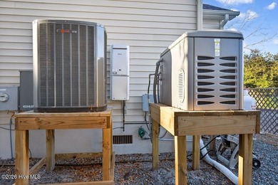 You'll love coming home to this well built, well maintained on Harbour Point Golf Club in North Carolina - for sale on GolfHomes.com, golf home, golf lot