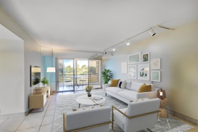 Discover your perfect retreat in this bright corner unit nestled on Poinciana Golf Club in Florida - for sale on GolfHomes.com, golf home, golf lot