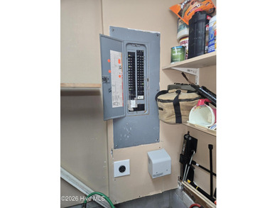 You'll love coming home to this well built, well maintained on Harbour Point Golf Club in North Carolina - for sale on GolfHomes.com, golf home, golf lot