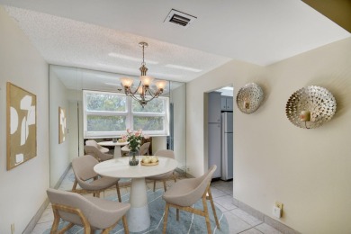 Discover your perfect retreat in this bright corner unit nestled on Poinciana Golf Club in Florida - for sale on GolfHomes.com, golf home, golf lot