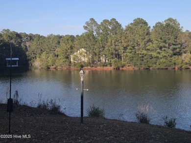 You'll love coming home to this well built, well maintained on Harbour Point Golf Club in North Carolina - for sale on GolfHomes.com, golf home, golf lot