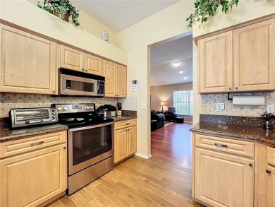 Welcome home to the highly desirable and beautiful Tuscawilla on Tuscawilla Country Club in Florida - for sale on GolfHomes.com, golf home, golf lot