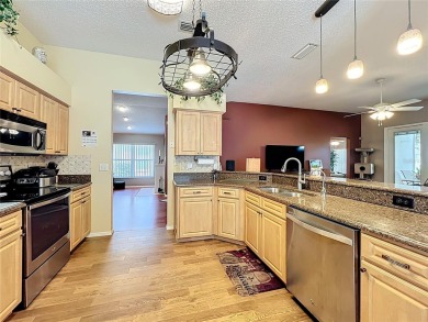 Welcome home to the highly desirable and beautiful Tuscawilla on Tuscawilla Country Club in Florida - for sale on GolfHomes.com, golf home, golf lot