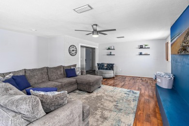 Beautifully updated 3 bedroom, 2 bath pool home in desirable on Daytona Beach Golf Club in Florida - for sale on GolfHomes.com, golf home, golf lot