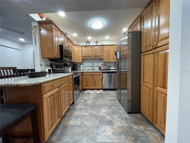 EXQUISITE Lakefront 55+ Residence | 2 Bed | 2 Bath | Private on Country Club At Silver Springs Shores in Florida - for sale on GolfHomes.com, golf home, golf lot