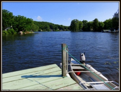 Proudly offered by the son of the first owner, this hidden gem on Lake Lackawanna Golf Course in New Jersey - for sale on GolfHomes.com, golf home, golf lot