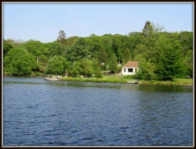 Proudly offered by the son of the first owner, this hidden gem on Lake Lackawanna Golf Course in New Jersey - for sale on GolfHomes.com, golf home, golf lot