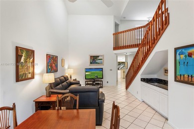 This spacious well maintained 3-bedroom, 2.5-bath townhome with on Woodmont Country Club in Florida - for sale on GolfHomes.com, golf home, golf lot