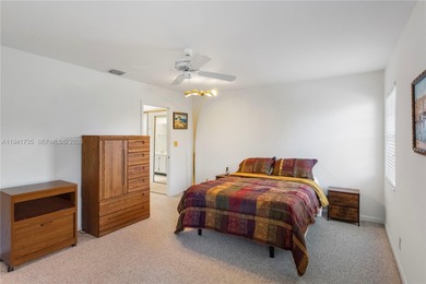 This spacious well maintained 3-bedroom, 2.5-bath townhome with on Woodmont Country Club in Florida - for sale on GolfHomes.com, golf home, golf lot