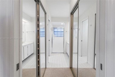 This spacious well maintained 3-bedroom, 2.5-bath townhome with on Woodmont Country Club in Florida - for sale on GolfHomes.com, golf home, golf lot