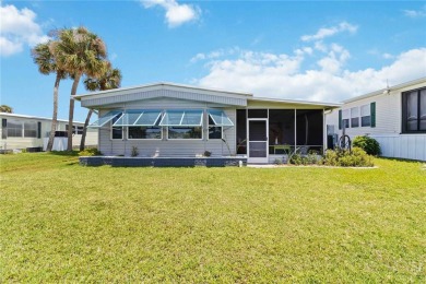 Welcome to effortless Florida living in this beautifully on Twin Isles Country Club in Florida - for sale on GolfHomes.com, golf home, golf lot