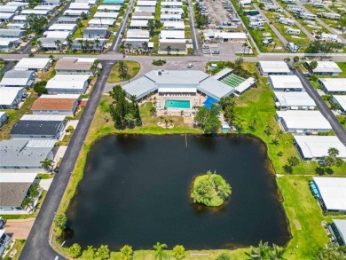 Welcome to effortless Florida living in this beautifully on Twin Isles Country Club in Florida - for sale on GolfHomes.com, golf home, golf lot