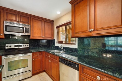 Beautifully updated lower-level Catalina end unit in a peaceful on Leisure Village Par 3 Golf Course in California - for sale on GolfHomes.com, golf home, golf lot