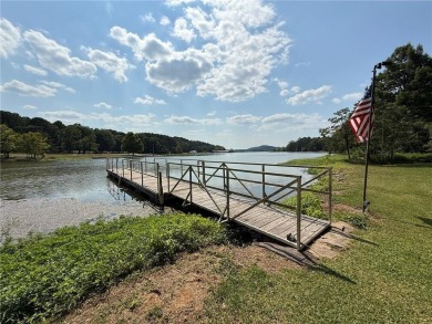 Charming Lakefront Home with Boat Dock & Stunning Sunsets
 on Lions Den Golf Club in Arkansas - for sale on GolfHomes.com, golf home, golf lot