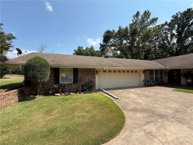 Charming Lakefront Home with Boat Dock & Stunning Sunsets
 on Lions Den Golf Club in Arkansas - for sale on GolfHomes.com, golf home, golf lot