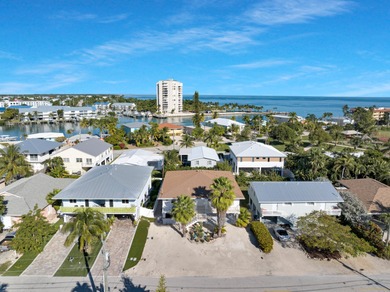 Discover this charming and affordable 2-bedroom, 2-bath half on Key Colony Beach Golf Course in Florida - for sale on GolfHomes.com, golf home, golf lot