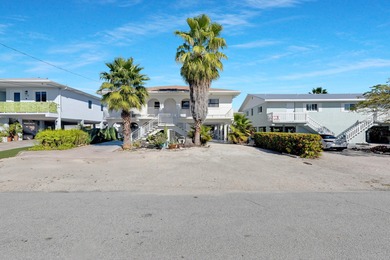 Discover this charming and affordable 2-bedroom, 2-bath half on Key Colony Beach Golf Course in Florida - for sale on GolfHomes.com, golf home, golf lot