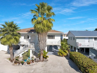 Discover this charming and affordable 2-bedroom, 2-bath half on Key Colony Beach Golf Course in Florida - for sale on GolfHomes.com, golf home, golf lot