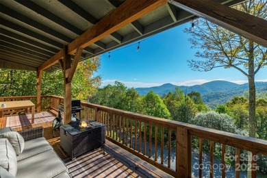 Offered FULLY FURNISHED, this stunning mountain retreat sits at on Wolf Laurel Country Club in North Carolina - for sale on GolfHomes.com, golf home, golf lot