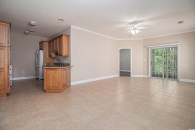 This beautifully maintained 3 bedroom and 2 bath end-unit condo on Heron Point Golf Club in South Carolina - for sale on GolfHomes.com, golf home, golf lot