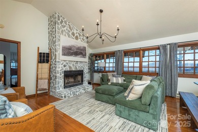 Offered FULLY FURNISHED, this stunning mountain retreat sits at on Wolf Laurel Country Club in North Carolina - for sale on GolfHomes.com, golf home, golf lot