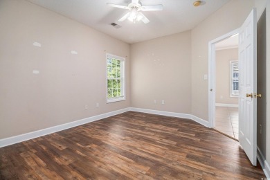 This beautifully maintained 3 bedroom and 2 bath end-unit condo on Heron Point Golf Club in South Carolina - for sale on GolfHomes.com, golf home, golf lot