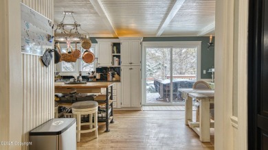 Stunning custom Victorian-inspired home where timeless charm on Bell Nob Golf Course in Wyoming - for sale on GolfHomes.com, golf home, golf lot