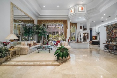 Situated on the North Golf Course in Ballenisles, this spacious on BallenIsles Golf and Country Club in Florida - for sale on GolfHomes.com, golf home, golf lot