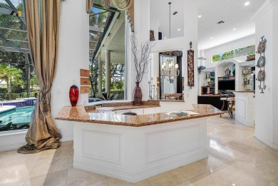 Situated on the North Golf Course in Ballenisles, this spacious on BallenIsles Golf and Country Club in Florida - for sale on GolfHomes.com, golf home, golf lot
