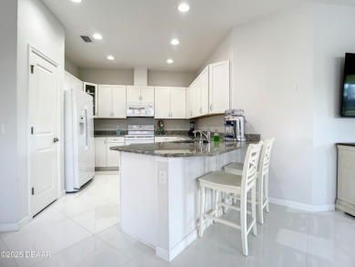 Your Slice of Paradise Is Calling! This spacious 3-bedroom on LPGA International Golf Course in Florida - for sale on GolfHomes.com, golf home, golf lot