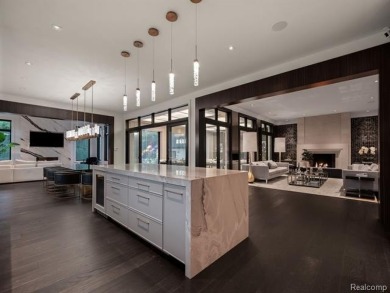 Welcome to this show-stopping estate in the prestigious gated on Meadowbrook Country Club in Michigan - for sale on GolfHomes.com, golf home, golf lot