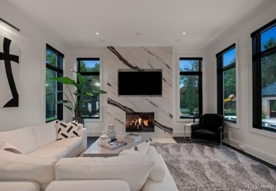 Welcome to this show-stopping estate in the prestigious gated on Meadowbrook Country Club in Michigan - for sale on GolfHomes.com, golf home, golf lot