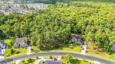 Huge lot in Cypress River Plantation perfect for your custom on Heron Point Golf Club in South Carolina - for sale on GolfHomes.com, golf home, golf lot