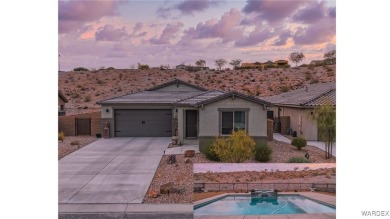 Welcome to your dream home in the prestigious gated neighborhood on Laughlin Ranch Golf Club in Arizona - for sale on GolfHomes.com, golf home, golf lot