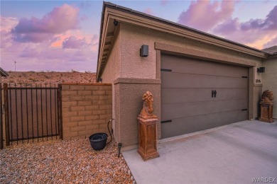 Welcome to your dream home in the prestigious gated neighborhood on Laughlin Ranch Golf Club in Arizona - for sale on GolfHomes.com, golf home, golf lot