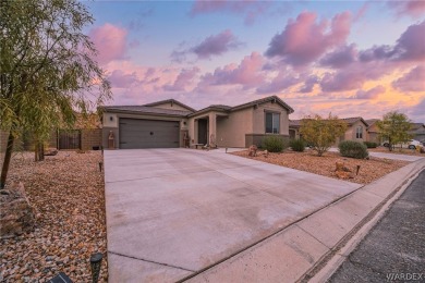 Welcome to your dream home in the prestigious gated neighborhood on Laughlin Ranch Golf Club in Arizona - for sale on GolfHomes.com, golf home, golf lot