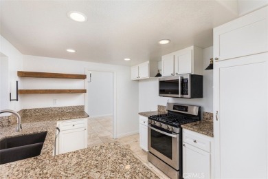 Welcome to this beautifully updated single-family home located on Menifee Lakes Country Club - Lakes in California - for sale on GolfHomes.com, golf home, golf lot