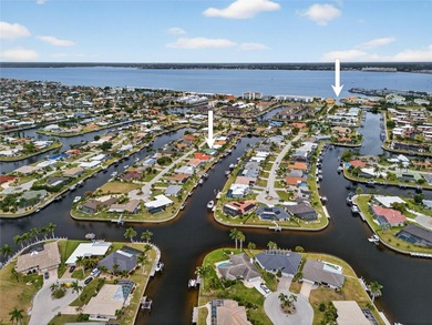 PUNTA GORDA ISLES! BEAUTIFULLY UPDATED 3 BEDROOM, 2 BATH, 2-CAR on Saint Andrews South Golf Club in Florida - for sale on GolfHomes.com, golf home, golf lot